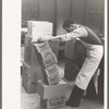 Checking delivery of supplies from wholesale grocery store, San Angelo, Texas