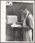 Checking delivery of supplies from wholesale grocery store. San Angelo, Texas
