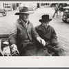 Farmer and son arriving in town in wagon, Eufaula, Oklahoma