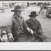 Farmer and son arriving in town in wagon, Eufaula, Oklahoma