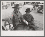 Farmer and son arriving in town in wagon, Eufaula, Oklahoma