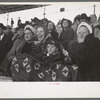 Spectators at a tense moment during the rodeo at the San Angelo Fat Stock Show, San Angelo, Texas