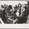 Selling peanuts in the grandstand during the rodeo at the San Angelo Fat Stock Show, San Angelo, Texas