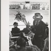Souvenir salesman at the San Angelo Fat Stock Show, San Angelo, Texas
