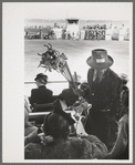 Souvenir salesman at the San Angelo Fat Stock Show, San Angelo, Texas