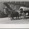 Old chuck wagon used for advertising purposes in parade which will open the San Angelo Fat Stock Show, San Angelo, Texas