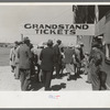 Spectators entering the grandstand to see the rodeo during the San Angelo Fat Stock Show, San Angelo, Texas