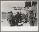 Spectators entering the grandstand to see the rodeo during the San Angelo Fat Stock Show, San Angelo, Texas