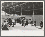 Spectators entering the grandstand to see the rodeo during the San Angelo Fat Stock Show, San Angelo, Texas
