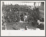 Crowd at the auction of the grand champion bull at the San Angelo Fat Stock Show, San Angelo, Texas