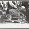 FSA (Farm Security Administration) supervisor examining sheep during a district meeting at San Angelo, Texas