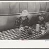 Cowboys eating breakfast at restaurant on the grounds of the San Angelo Fat Stock Show, San Angelo, Texas