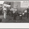 Orchestra playing outside a grocery store on Saturday afternoon which is designed to attract customers to the store, Phoenix, Arizona