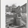 Garbage disposal and water supply at end of the row shelters in Agua Fria Migratory Labor Camp, Arizona