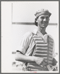 Migratory laborers like to play baseball. Here is one of them in a catchers uniform at the Agua Fria Migratory Labor Camp, Arizona