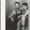 Migratory laborer and his son living at the Agua Fria Migratory Labor Camp, Arizona