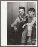 Migratory laborer and his son living at the Agua Fria Migratory Labor Camp, Arizona