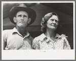 Migratory laborer and his wife at the Agua Fria Migratory Labor Camp, Arizona