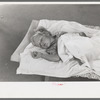 Little girl taking nap at the Work Projects Administration nursery school at the Casa Grande Valley Farms, Pinal County, Arizona