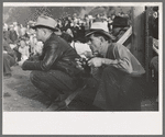 Candid cameraman at miners contest at Labor Day celebration, Silverton, Colorado