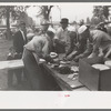 Serving barbecue at the free barbecue on Labor Day at Ridgeway, Colorado