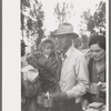 Getting barbecue and coffee at the free barbecue at Ridgeway, Colorado, on Labor Day