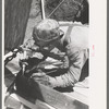 Spot welder at work on Shasta Dam, Shasta County, California