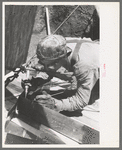 Spot welder at work on Shasta Dam, Shasta County, California