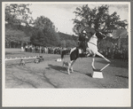 High school horse performs before children of construction workers at Summit City School, Summit City, California