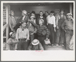Construction workers on front porch of commissary, Shasta Dam, Shasta County, California