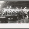 Construction workers playing pool in commissary, Shasta Dam, Shasta County, California