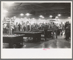 Construction workers playing pool in commissary, Shasta Dam, Shasta County, California