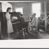 Pianist and one of the leaders at the all day community sing, Pie Town, New Mexico. Various members of the group take turns as leader