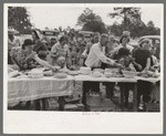 Farm folks, mostly homesteaders, at dinner during the all day community sing, Pie Town, New Mexico