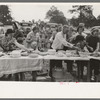 Farm folks, mostly homesteaders, at dinner during the all day community sing, Pie Town, New Mexico