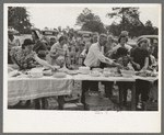 Farm folks, mostly homesteaders, at dinner during the all day community sing, Pie Town, New Mexico