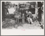 Farm folks eating dinner at the all day community sing, Pie Town, New Mexico