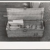 Box containing samples of milled tailing solutions which are sent to Silver City, New Mexico, for analysis, Mogollon, New Mexico