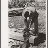 Finishing tie with broad axe, Pie Town, New Mexico