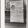 Sign in post office window announcing baby clinic, Taos, New Mexico