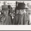 Men talking on the streets of Taos, New Mexico
