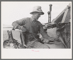 Mormon farmer who lives in Snowville, Utah and who farms in Oneida County, Idaho, bagging wheat