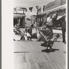 Spanish-American girl in native dance. Fiesta at Taos, New Mexico