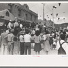 Crowd watching native Spanish-American dances at fiesta, Taos, New Mexico