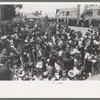 Crowd of people watching the dance at fiesta, Taos, New Mexico