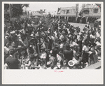 Crowd of people watching the dance at fiesta, Taos, New Mexico