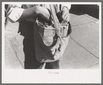 Newsboy's sack of papers, Montrose, Colorado