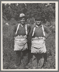 Peach pickers with sackful of peaches, Delta County, Colorado. These are local boys