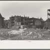 Vacant lot and apartment building in Negro section of Chicago, Illinois