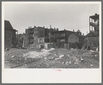 Vacant lot and apartment building in Negro section of Chicago, Illinois